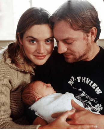 Mia with her parents, Kate and Jim